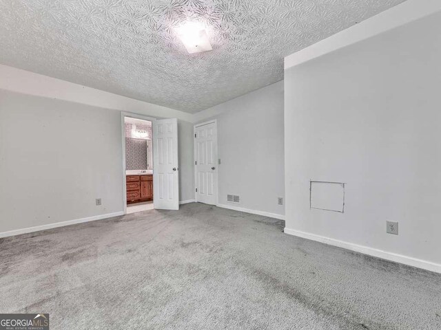 301 Jetta Ln, Canton, GA 30115 - unfurnished room with carpet, baseboards, and a textured ceiling