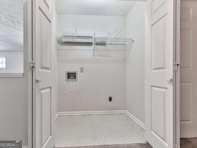 301 Jetta Ln, Canton, GA 30115 - washroom featuring washer hookup, a textured ceiling, baseboards, and electric dryer hookup