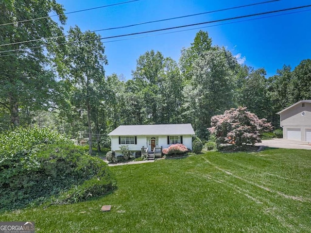 301 Jetta Ln, Canton, GA 30115 - bi-level home with a garage and a front yard