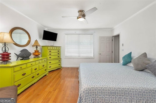 3 Stewart Ave, Saint Simons, GA 31522 - bedroom featuring light wood-style flooring, ornamental molding, and ceiling fan