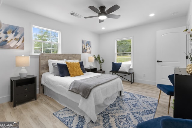 2014 Fence Rd, Dacula, GA 30019 - bedroom with light wood finished floors, a ceiling fan, recessed lighting, and baseboards