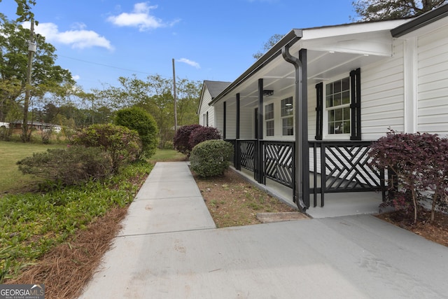 2014 Fence Rd, Dacula, GA 30019 - view of property exterior featuring a porch