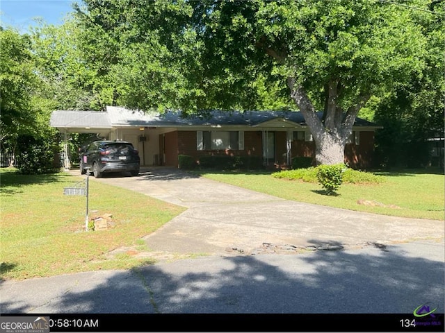 111 Mason Dr, Centerville, GA 31028 - single story home featuring driveway, a front yard, and an attached carport