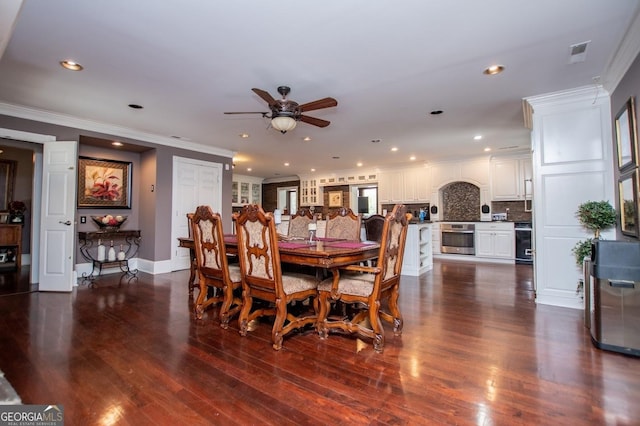1050 Denton Rd, Douglasville, GA 30134 - dining space with a ceiling fan, recessed lighting, dark wood finished floors, ornamental molding, and baseboards