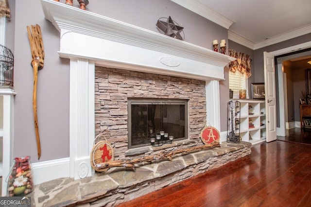 1050 Denton Rd, Douglasville, GA 30134 - detailed view of wood finished floors, ornamental molding, and a stone fireplace