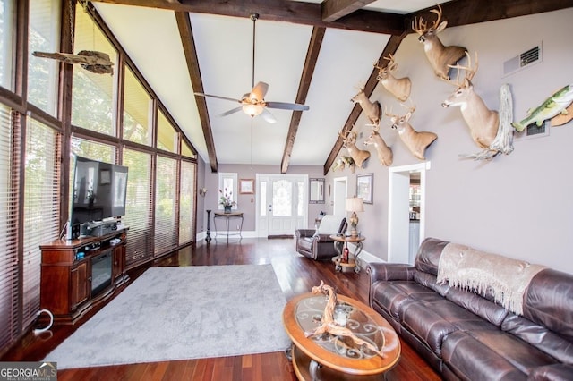 1050 Denton Rd, Douglasville, GA 30134 - living area featuring high vaulted ceiling, wood finished floors, a ceiling fan, beamed ceiling, and baseboards