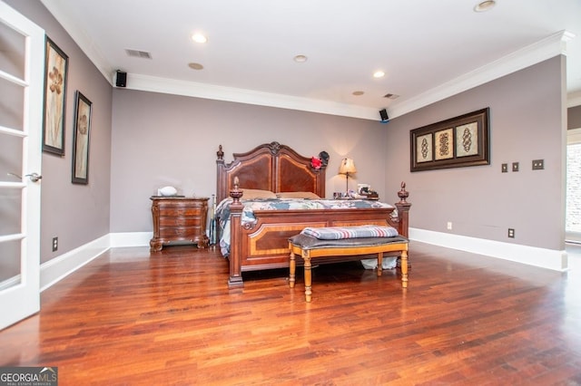 1050 Denton Rd, Douglasville, GA 30134 - bedroom with crown molding, wood finished floors, baseboards, and recessed lighting