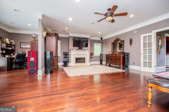 1050 Denton Rd, Douglasville, GA 30134 - living area featuring an office area, ornamental molding, a ceiling fan, wood finished floors, and french doors