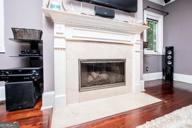 1050 Denton Rd, Douglasville, GA 30134 - detailed view of wood finished floors, a premium fireplace, and baseboards