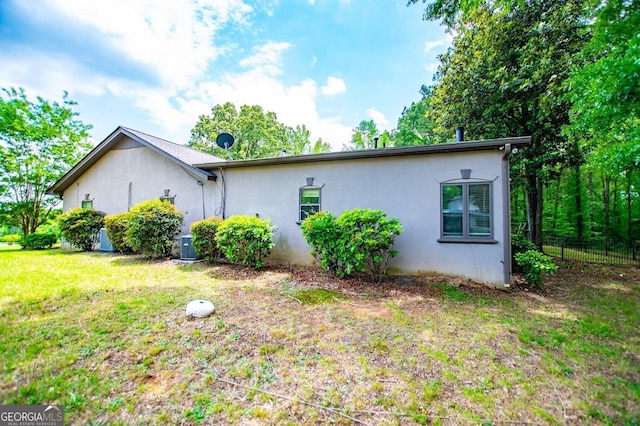 1050 Denton Rd, Douglasville, GA 30134 - view of property exterior with stucco siding