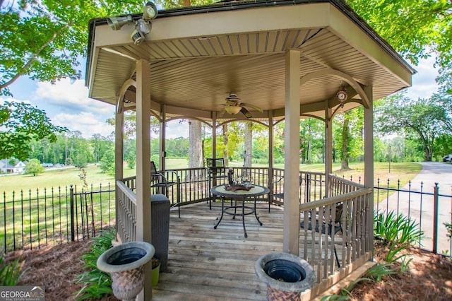 1050 Denton Rd, Douglasville, GA 30134 - wooden terrace with a gazebo, ceiling fan, and view of wooded area