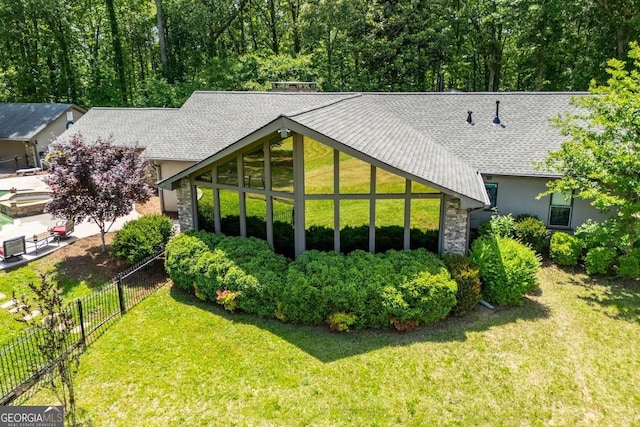 1050 Denton Rd, Douglasville, GA 30134 - rear view of house featuring stone siding and a shingled roof