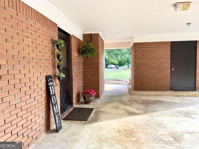 204 Biltmore Ter, Warner Robins, GA 31088 - single story home with brick siding, a chimney, a front lawn, roof with shingles, and a patio