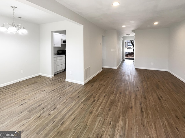 3008 Pine Tree Trl # 16D, South Fulton, GA 30349 - empty room with dark wood-style floors, recessed lighting, a chandelier, and baseboards