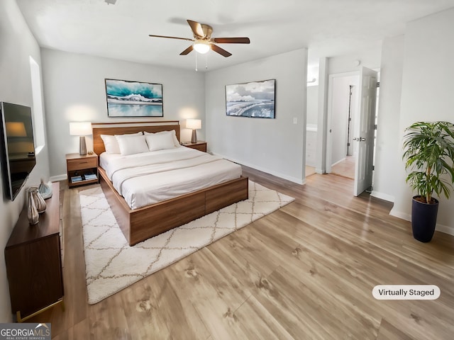 3008 Pine Tree Trl # 16D, South Fulton, GA 30349 - bedroom with wood finished floors, baseboards, and a ceiling fan