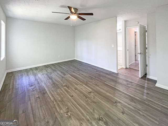 3008 Pine Tree Trl # 16D, South Fulton, GA 30349 - spare room with ceiling fan, dark wood-type flooring, and baseboards