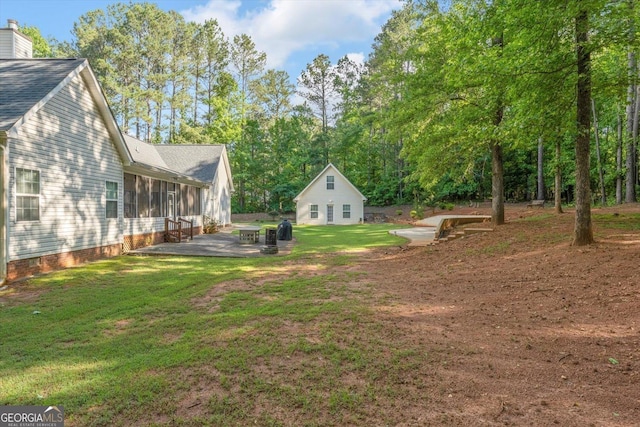 413 Tuxedo Dr, Commerce, GA 30530 - view of green lawn featuring a patio