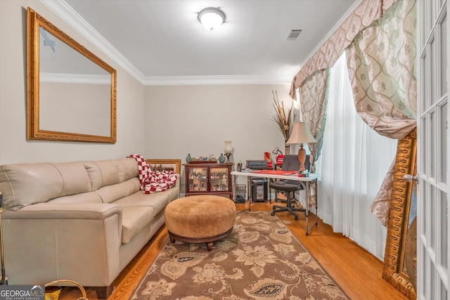 413 Tuxedo Dr, Commerce, GA 30530 - living room featuring crown molding, a desk, and wood finished floors