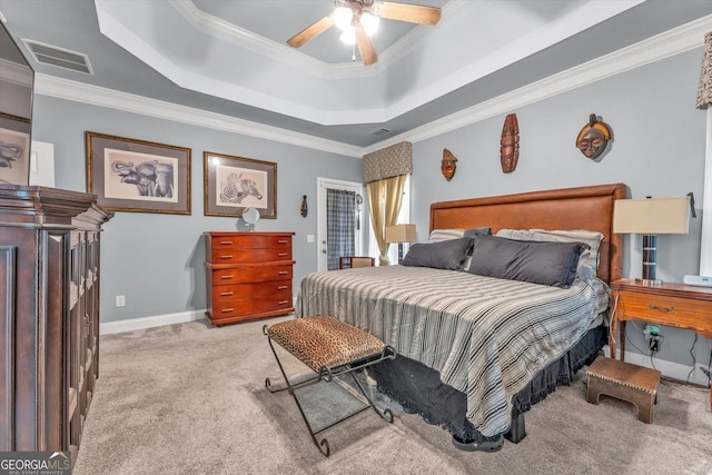 413 Tuxedo Dr, Commerce, GA 30530 - carpeted bedroom with a tray ceiling, ornamental molding, baseboards, and ceiling fan