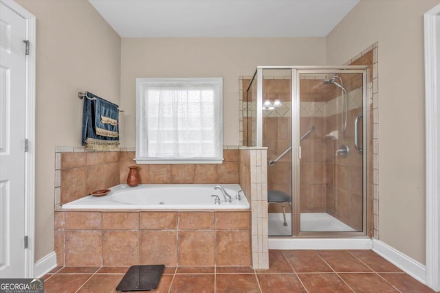 413 Tuxedo Dr, Commerce, GA 30530 - full bathroom with a garden tub, tile patterned floors, and a stall shower