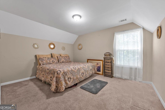 413 Tuxedo Dr, Commerce, GA 30530 - carpeted bedroom featuring lofted ceiling and baseboards