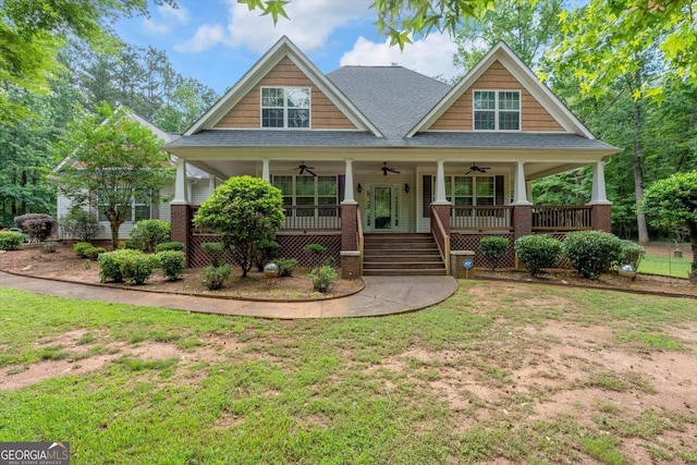 413 Tuxedo Dr, Commerce, GA 30530 - craftsman inspired home featuring ceiling fan, a porch, a front yard, and a shingled roof
