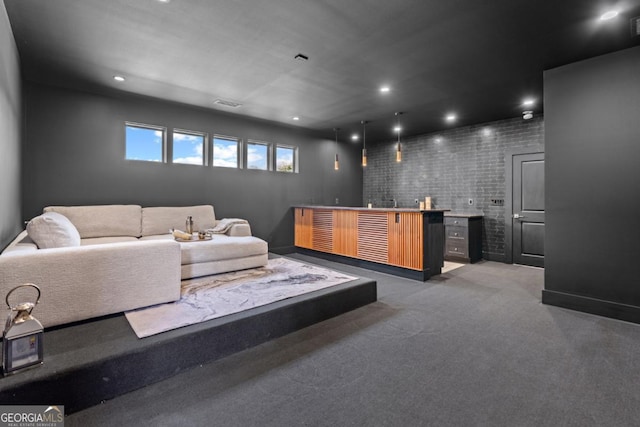 5370 Greenleaf Dr SW, Mableton, GA 30126 - living area with bar with sink, recessed lighting, and light carpet