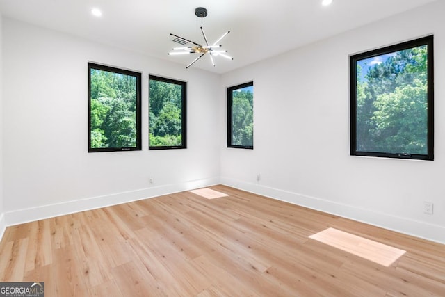 5370 Greenleaf Dr SW, Mableton, GA 30126 - spare room featuring baseboards, light wood-style flooring, and recessed lighting