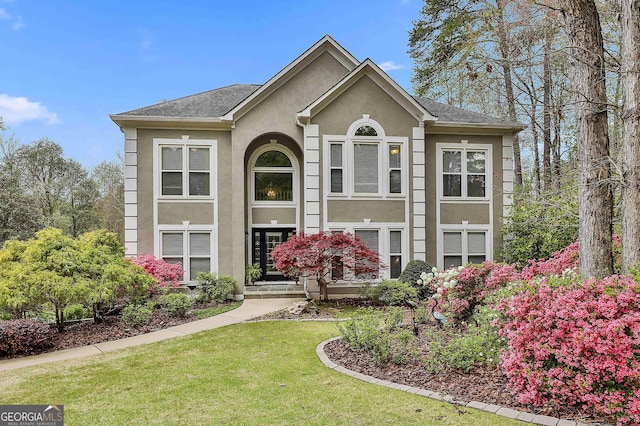 1000 Pleasance Grv, Peachtree City, GA 30269 - view of front of property with stucco siding and a front lawn