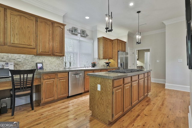 1000 Pleasance Grv, Peachtree City, GA 30269 - kitchen with stainless steel appliances, a sink, tasteful backsplash, a center island, and brown cabinets