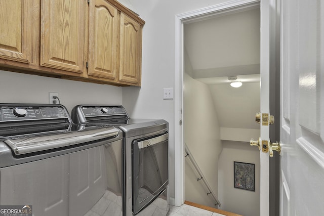 1000 Pleasance Grv, Peachtree City, GA 30269 - laundry room featuring washer and dryer, cabinet space, and light tile patterned flooring