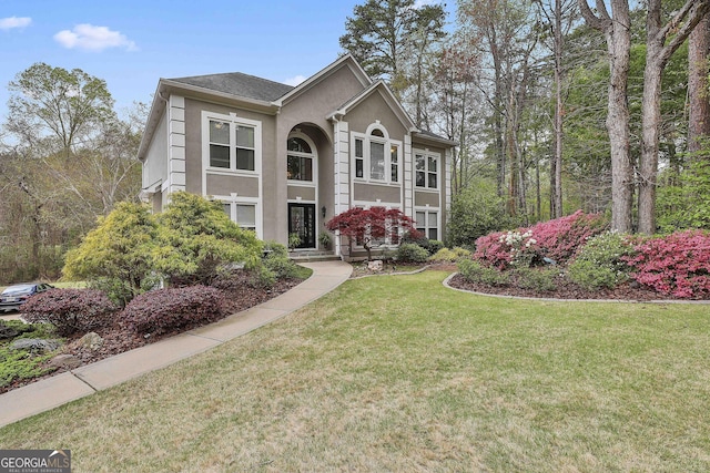 1000 Pleasance Grv, Peachtree City, GA 30269 - view of front facade featuring stucco siding and a front lawn