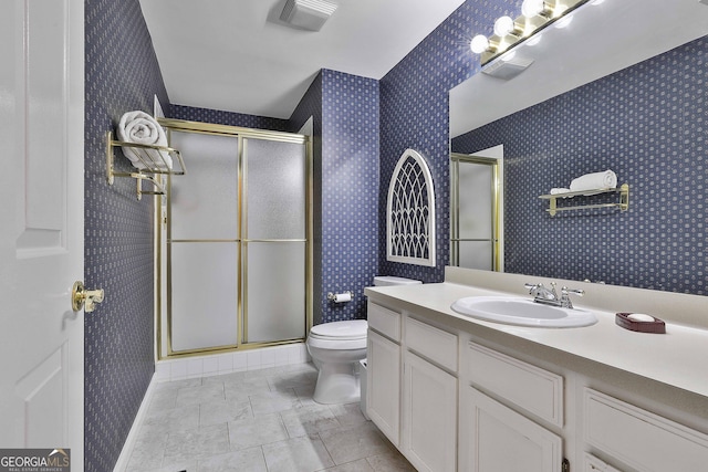 1000 Pleasance Grv, Peachtree City, GA 30269 - full bathroom featuring toilet, a shower stall, vanity, wallpapered walls, and baseboards