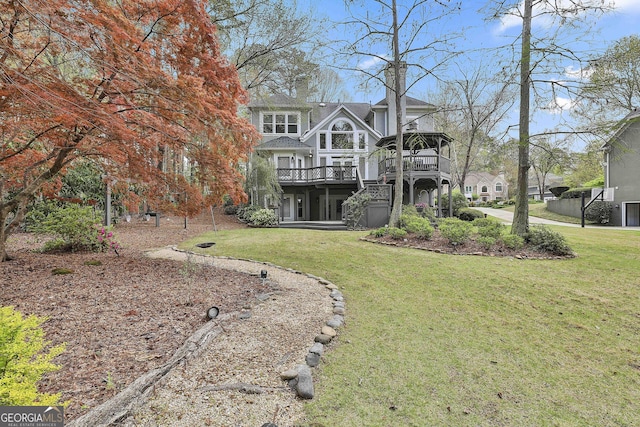 1000 Pleasance Grv, Peachtree City, GA 30269 - rear view of house with a deck, a yard, and a chimney
