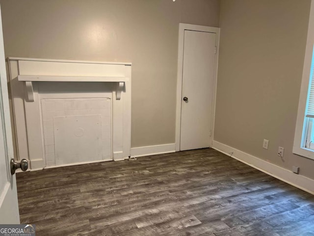 243 Old Acworth Rd, Dallas, GA 30132 - unfurnished bedroom with dark wood-style flooring and baseboards