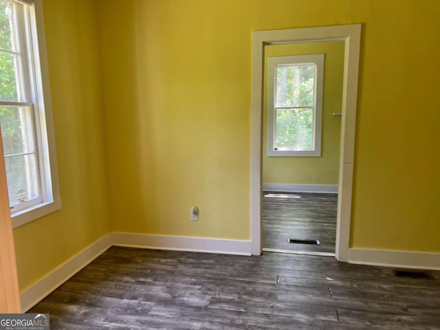 243 Old Acworth Rd, Dallas, GA 30132 - unfurnished room with plenty of natural light, dark wood-type flooring, and baseboards
