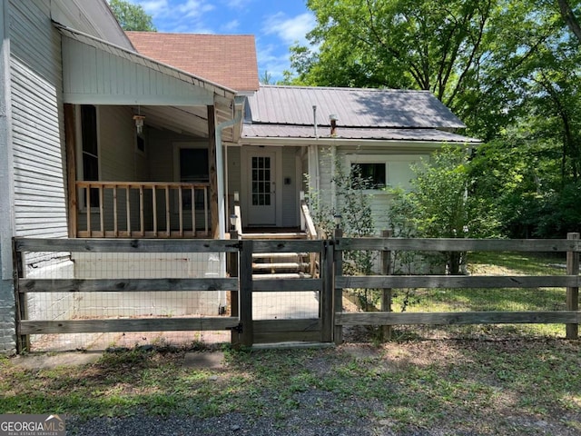 243 Old Acworth Rd, Dallas, GA 30132 - view of front of house featuring a fenced front yard and metal roof