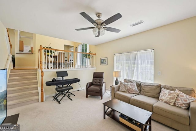 3705 Tate Pl, Austell, GA 30106 - living room with stairs, ceiling fan, and carpet