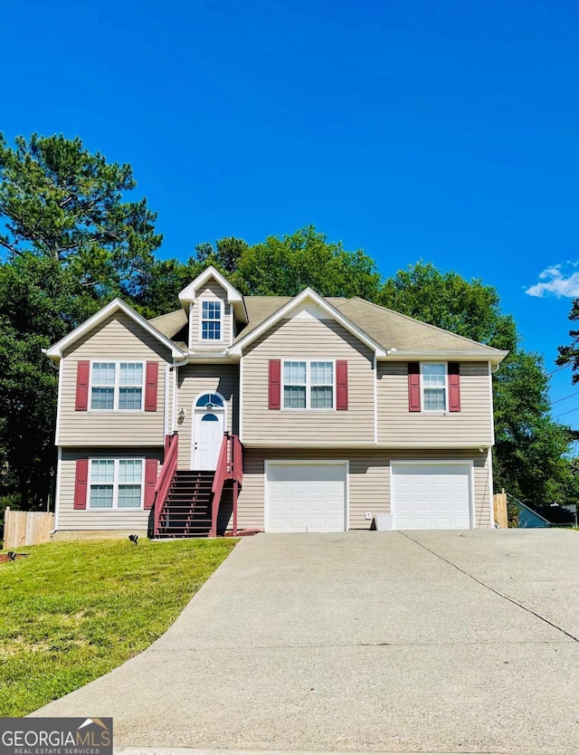 350 Fall View Ct, Winder, GA 30680 - raised ranch with an attached garage and concrete driveway