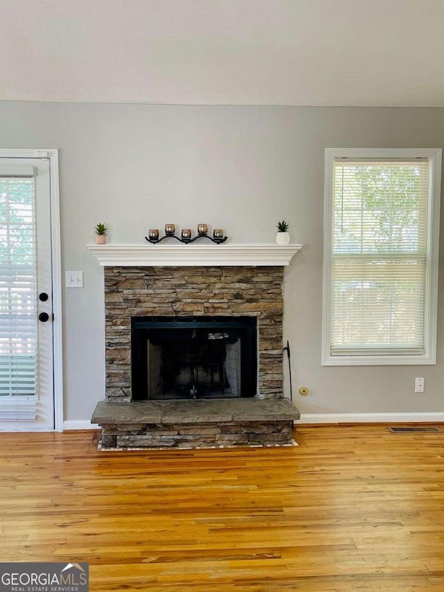350 Fall View Ct, Winder, GA 30680 - detailed view of wood finished floors and a fireplace