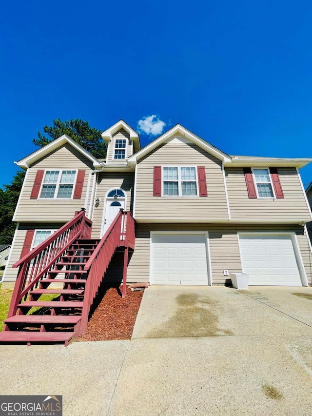 350 Fall View Ct, Winder, GA 30680 - raised ranch featuring a garage and concrete driveway