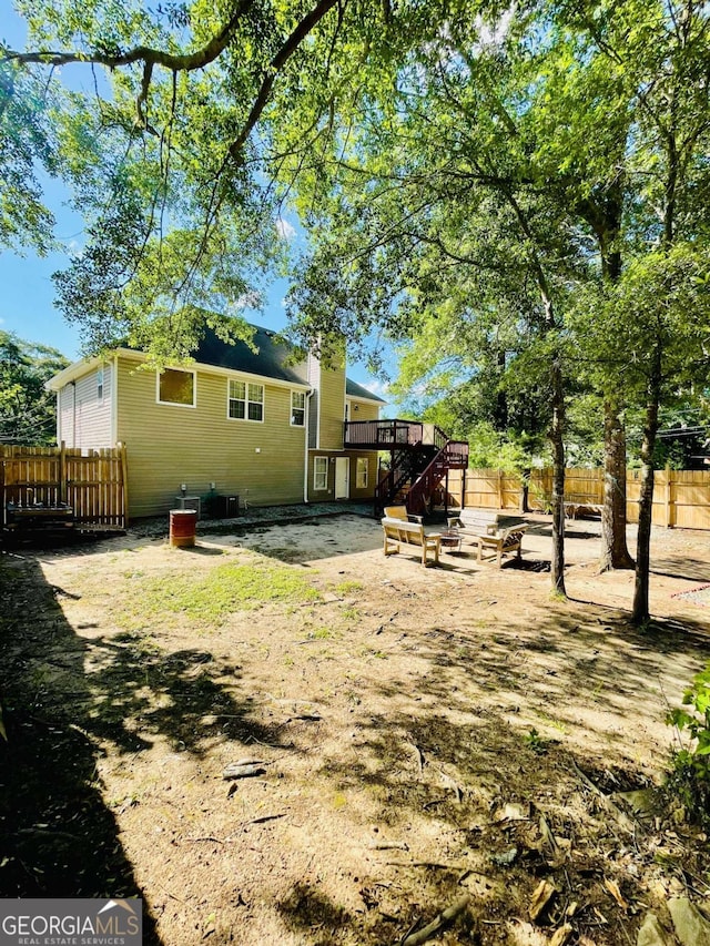 350 Fall View Ct, Winder, GA 30680 - rear view of house with stairway and a deck