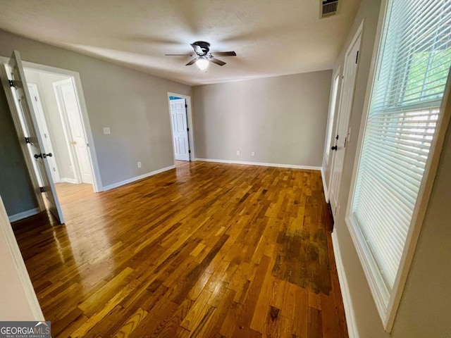 350 Fall View Ct, Winder, GA 30680 - empty room with ceiling fan and wood finished floors