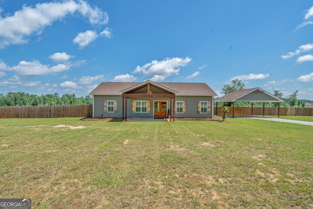 1354 Lakeway Rd, East Dublin, GA 31027 - single story home featuring a fenced backyard, concrete driveway, and a carport