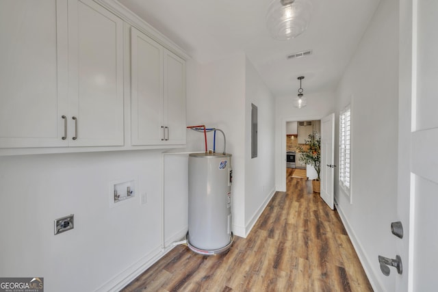 1354 Lakeway Rd, East Dublin, GA 31027 - hallway with electric water heater and wood finished floors