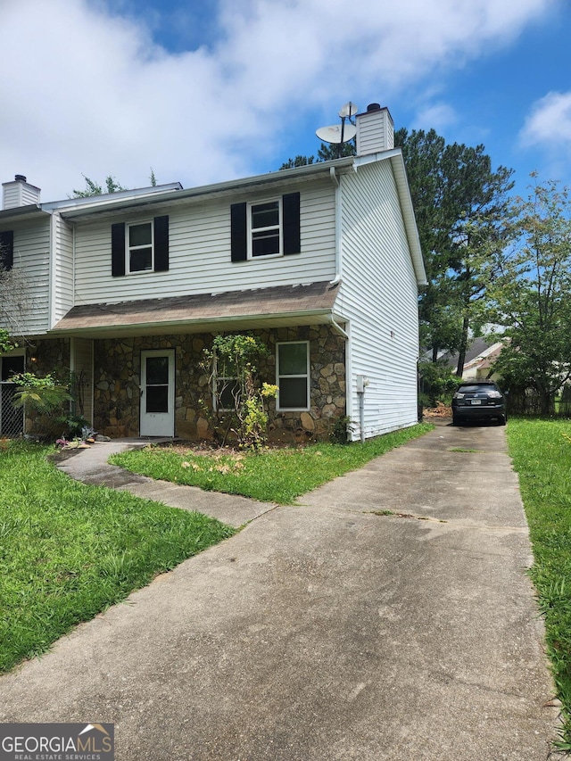 3503 Ten Oaks Ct, Powder Springs, GA 30127 - view of front of property with a chimney, stone siding, and driveway