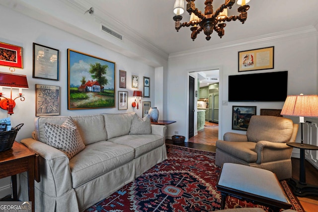 2660 Peachtree Rd Unit 6A, Atlanta, GA 30305 - living area with ornamental molding and a chandelier