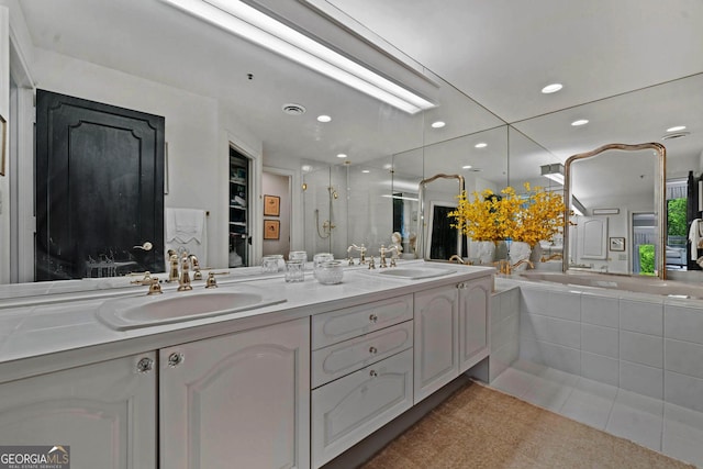 2660 Peachtree Rd Unit 6A, Atlanta, GA 30305 - full bath featuring double vanity, a bath, a stall shower, recessed lighting, and tile patterned floors