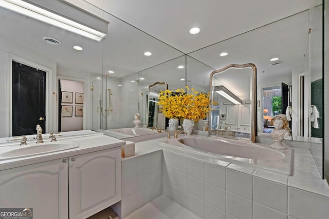 2660 Peachtree Rd Unit 6A, Atlanta, GA 30305 - full bath featuring a garden tub, vanity, a shower stall, and recessed lighting