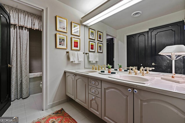 2660 Peachtree Rd Unit 6A, Atlanta, GA 30305 - bathroom with tile patterned flooring and double vanity